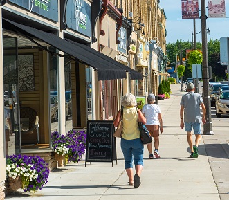 A picture of a women walking in downtown Seaforth.