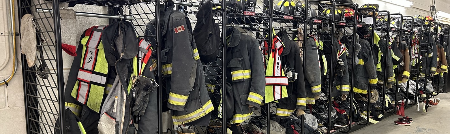 A photo of bunker gear lined up at the Seaforth Fire Hall.