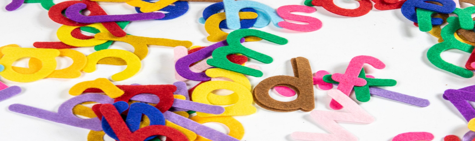 Scattered assorted cutouts of alphabet