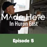 [A photo of a worker moving switches captured from Episode 5 of the Made Here in Huron East video series.]